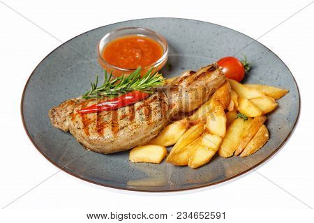 Fried Meat With Garnish Of Potatoes Isolated On White Background