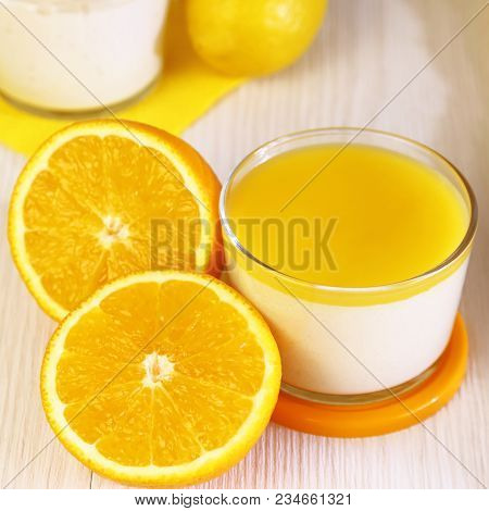 Food. Panna Cotta. Italian Milk Fruity Dessert Made Of Yogurt And Cream With Lemon And Orange.