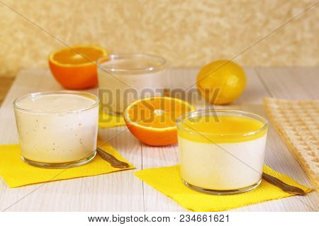Food. Panna Cotta. Milk Fruit Dessert Made Of Yogurt And Cream With Lemon And Orange.