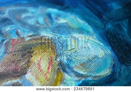 Texture Of A Canvas With Large Brushstokes Of Blue Oil Paint. Close-up, Selective Focus.