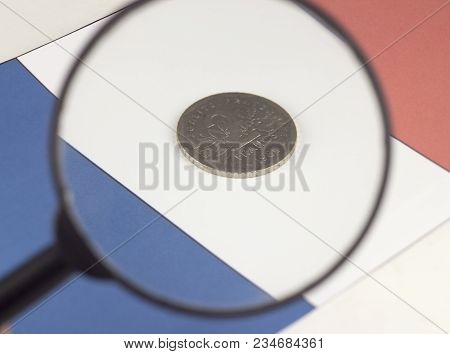 Money Of France Against The Background Of The Flag Of The Loupe