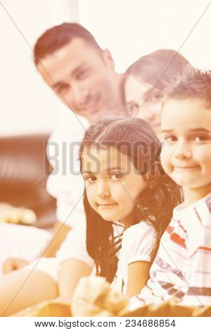 happy young family relax and have fun at modern home indooor
