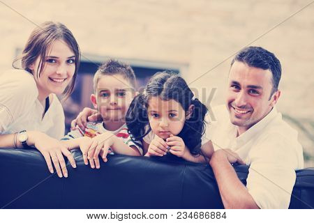 happy young family relax and have fun at modern home indooor