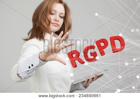 RGPD, Spanish, French and Italian version version of GDPR: Reglamento General de Proteccion de datos. General Data Protection Regulation. Young woman working with information.