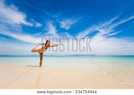 Tropical Summer Yoga Session On Beautiful Sunset Beach, Koh Kradan Island In Thailand. Vriksha Asana