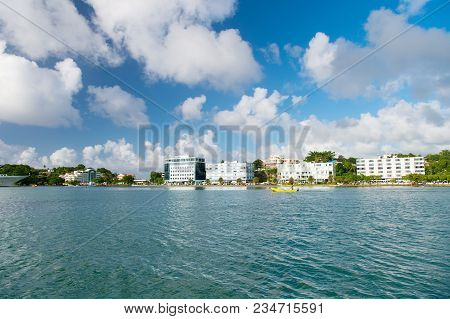 Sea Beach With Buildings On Cloudy Blue Sky In Castries, St.lucia. Summer Vacation On Tropical Islan