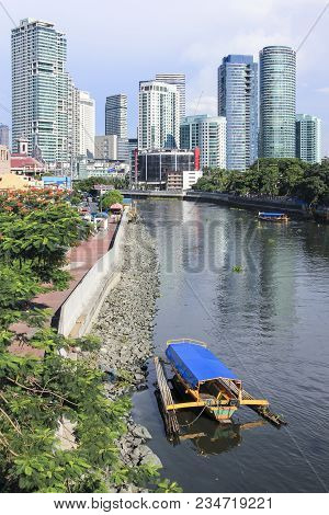 Manila - June 12: Small Passenger Ferry Boats Crossing The Pasig River From  Makati To Highrise Rock