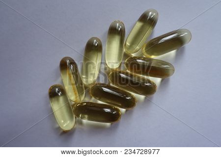 Closeup Of Capsules Of Fish Oil In A Shape Of Spike