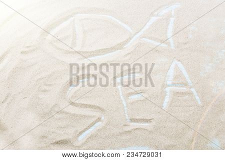 The Inscription Of The Sea On The Sand Of The Sea Shore