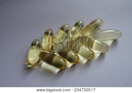 Macro Of Capsules Of Fish Oil In A Shape Of Spike