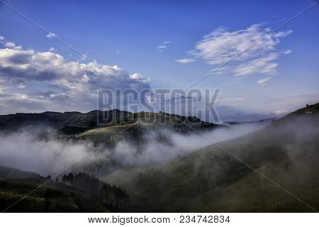 Beautiful Mountain Landscape Of A Foggy Morning With Trees And Clouds, Dumesti, Salciua, Apuseni, Ro