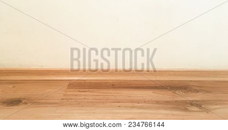 Room Wood Floor Perspective, Grunge Pastel Painted Concrete Wall And Varnished Wooden Laminate Plank