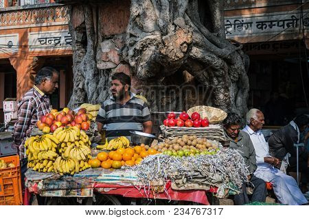 Jaipur, India - January 12, 2018: Street Trading Fruit Shop. A Man Sells Fruit