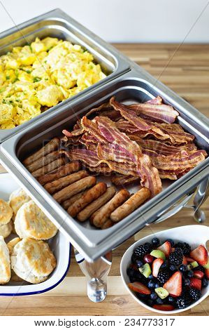 Breakfast Buffet With Scrambled Eggs, Sausage And Bacon