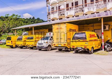 Phuket, Thailand - Dec 12, 2016: Dhl Courier Pick-up Cars Parked At A Dhl Office Shipment Facility I