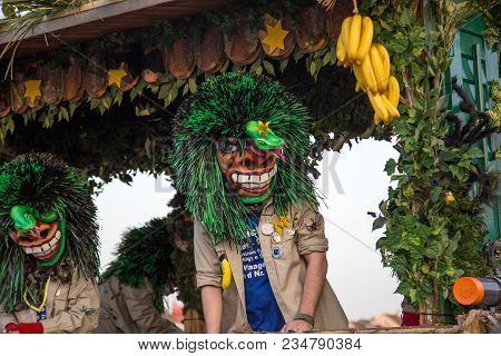 Basel, Switzerland - March 10, 2014: Dressed Up Person, A So Called Waggis At The Traditional Carniv