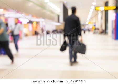 People Crowd Background With An Intentional Blur Effect Applied.