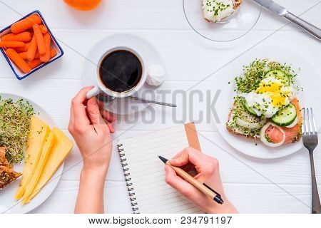 Morning Habits Of Successful People. Day Planning And Healthy Eating. Woman Drink Coffee And Writing