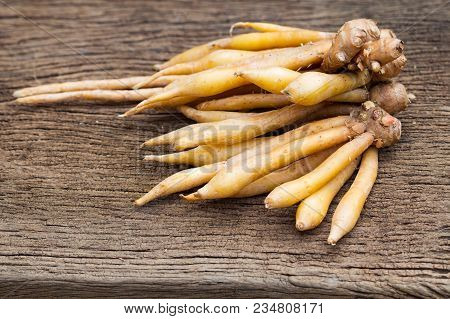 Finger Root Ingredients For Thai Cuisine And Thai Herb On Wooden Table