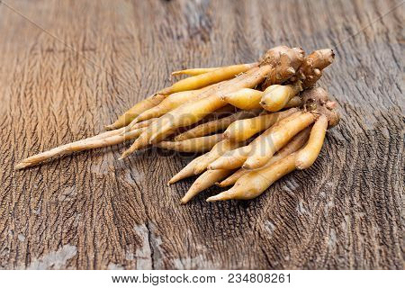 Finger Root Ingredients For Thai Cuisine And Thai Herb On Wooden Table