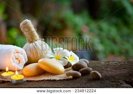 Spa Concept With Organic Soap And Burning Candles In The Dark