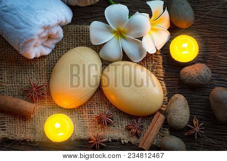 Spa Concept With Organic Soap And Burning Candles In The Dark