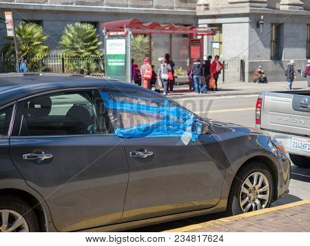 San Francisco, Ca - March 25, 2018: Car Parked With A Patched Up Broken Window In Downtown San Franc