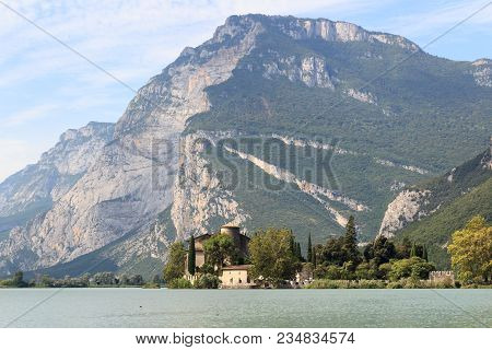 Castle Castel Toblino At Lake Lago Di Toblino And Mountain Panorama In Italy