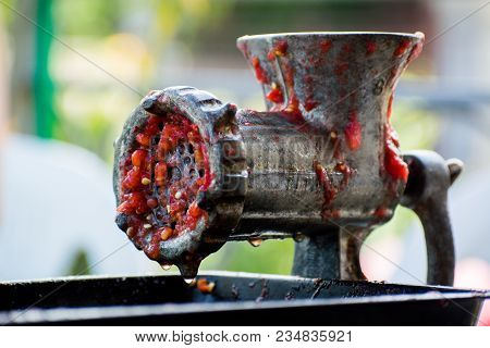 Hand-powered Mincing Machine Used For Grinding Paprika.