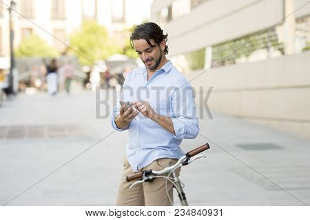 Young Happy Attractive Hispanic Man In Casual Trendy Clothes Smiling Cheerful Using Mobile Phone On 