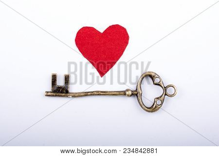 Retro Style Key On A Colorful Background