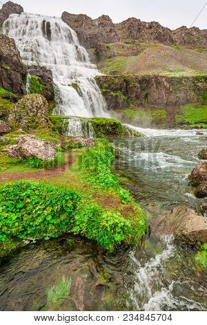 At The Foot Of A Waterfall Dynjandi, Iceland