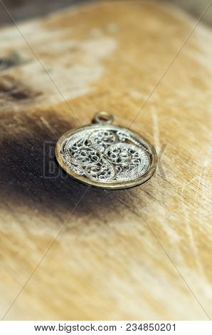 The Work Of Jewelers. Trial Jewelry Of Semiprecious Metals. Round Brooch With A Braided Pattern. Sel