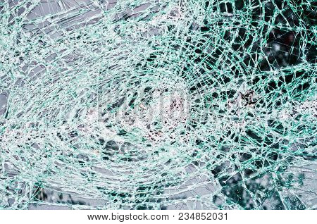 Glass Destroyed In Thousands Of Cracks Like A Dense Web Of Cuts