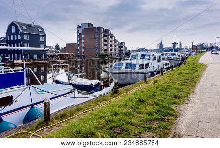 Sunset Strip . Modern Apartment House . Traditional Apartment House In Holland . Sunrise Clouds .