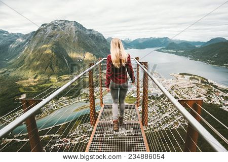 Young Woman Walking Alone On Rampestreken Viewpoint Mountains Aerial View Travel Lifestyle Adventure