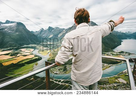 Man Raised Hand Exploring Mountains In Norway Travel Lifestyle Adventure Vacations Success Emotions 