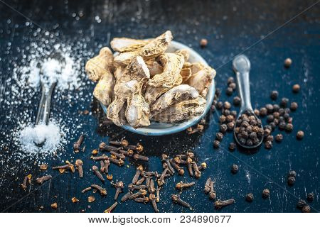 Close Up Of Ayurvedic Herb Or Folk Medicine Dried Ginger Or Zingiber Officinale With Black Pepper Co