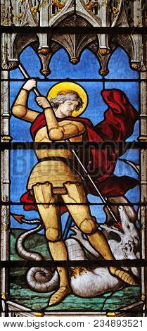 PARIS, FRANCE - JANUARY 04: Saint George slaying the dragon, stained glass window in Saint Severin church in Paris, France on January 04, 2018.