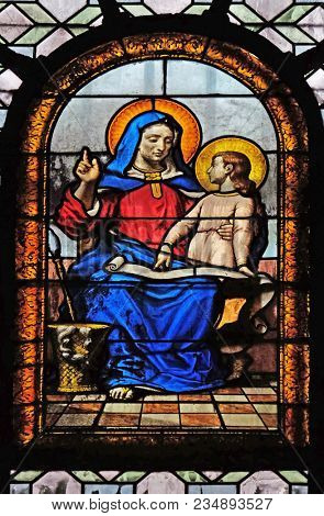 PARIS, FRANCE - JANUARY 04: Saint Anne, stained glass window in the Saint Sulpice Church, Paris, France on January 04, 2018.