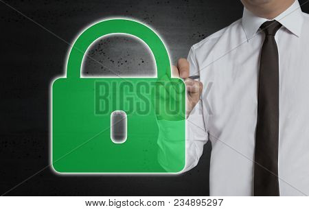 Green U-lock Is Written By Businessman On Computer Screen.