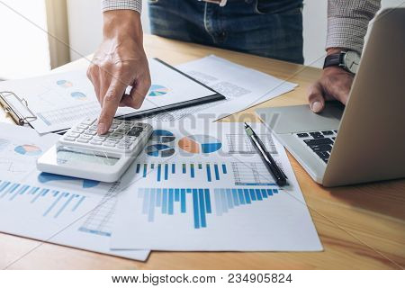 Business Man Or Accountant Working Financial Investment On Calculator With Calculate Analyze Busines
