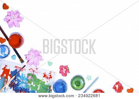 Color Gouache Jars On White Background. Top View, Copy Space