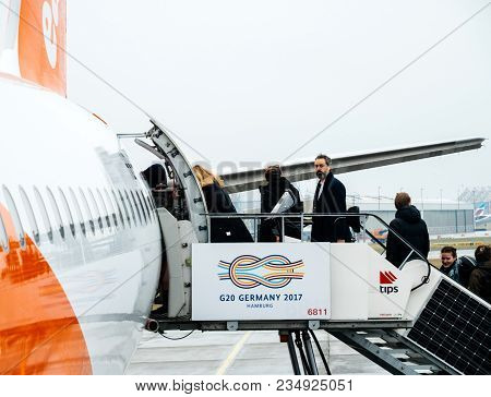 Hamburg, Germany - Mar 22, 2018: Passengers Entering Easyjet Airplane Early In The Morning In Flugha