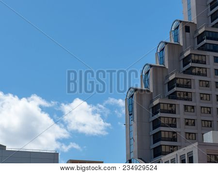 Row Of Staircased Building Floors On Tall Building On A Sunny Day