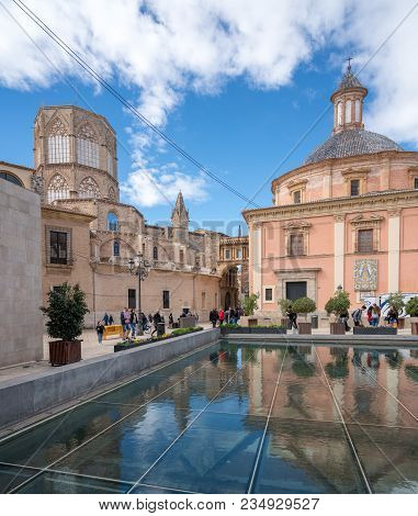 Valencia, Spain - March 16, 2018: Cathedral And Basilica With Reflection In Valencia In Spain