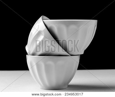 White Bowl Isolated On Black And White Background Used In Kitchens
