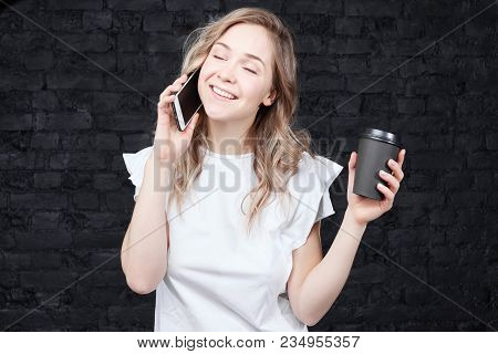 Happy Caucasian Lady Drinking Coffee To Go, Talking On Mobile Phone With Lover, Closing Eyes From Pl