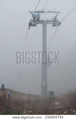 Alpinist Is Rescue People Exercise On Gondola Car