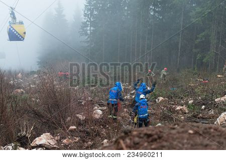 Rescue Man Helping Out On Land With Rope